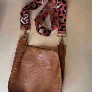 Stylish Brown Leather Bag with Leopard Strap